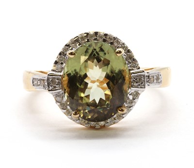 Lot 216 - An 18ct gold gemstone and diamond cluster ring