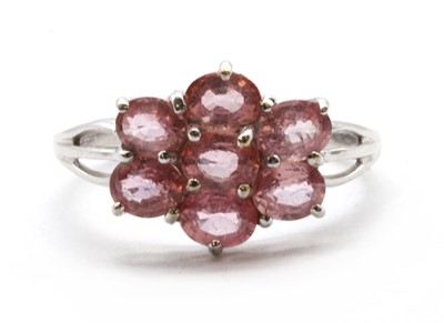 Lot 184 - An 18ct white gold pink sapphire cluster ring