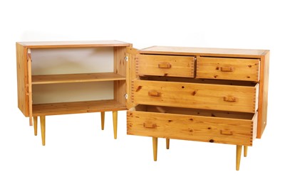 Lot 492 - A Danish pine chest of four drawers and a cupboard