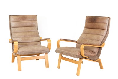 Lot 355 - A pair of Danish bentwood and tan leather lounge chairs