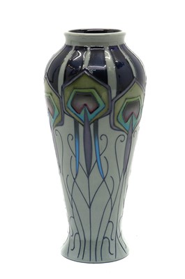 Lot 62 - A Moorcroft pottery 'Peacock Parade' pattern trial vase
