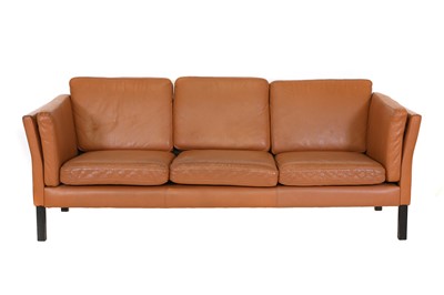 Lot 372 - A Danish tan leather three-seater settee