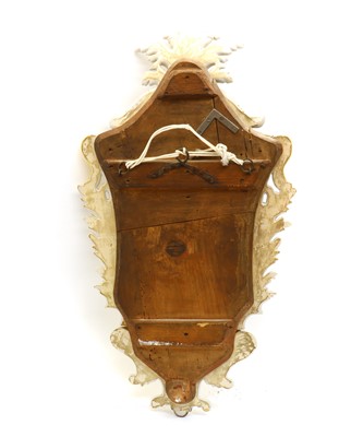 Lot 101 - A Faience pottery mirror