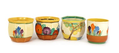 Lot 138 - A collection of four Clarice Cliff fern planters