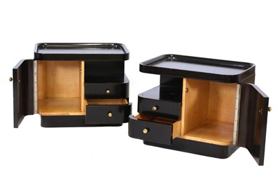 Lot 84 - A pair of German Art Deco mahogany bedside tables
