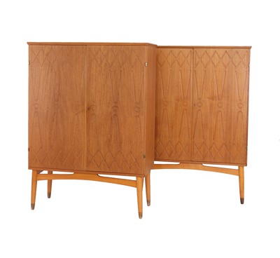 Lot 395 - A pair of Swedish two-door teak cabinets