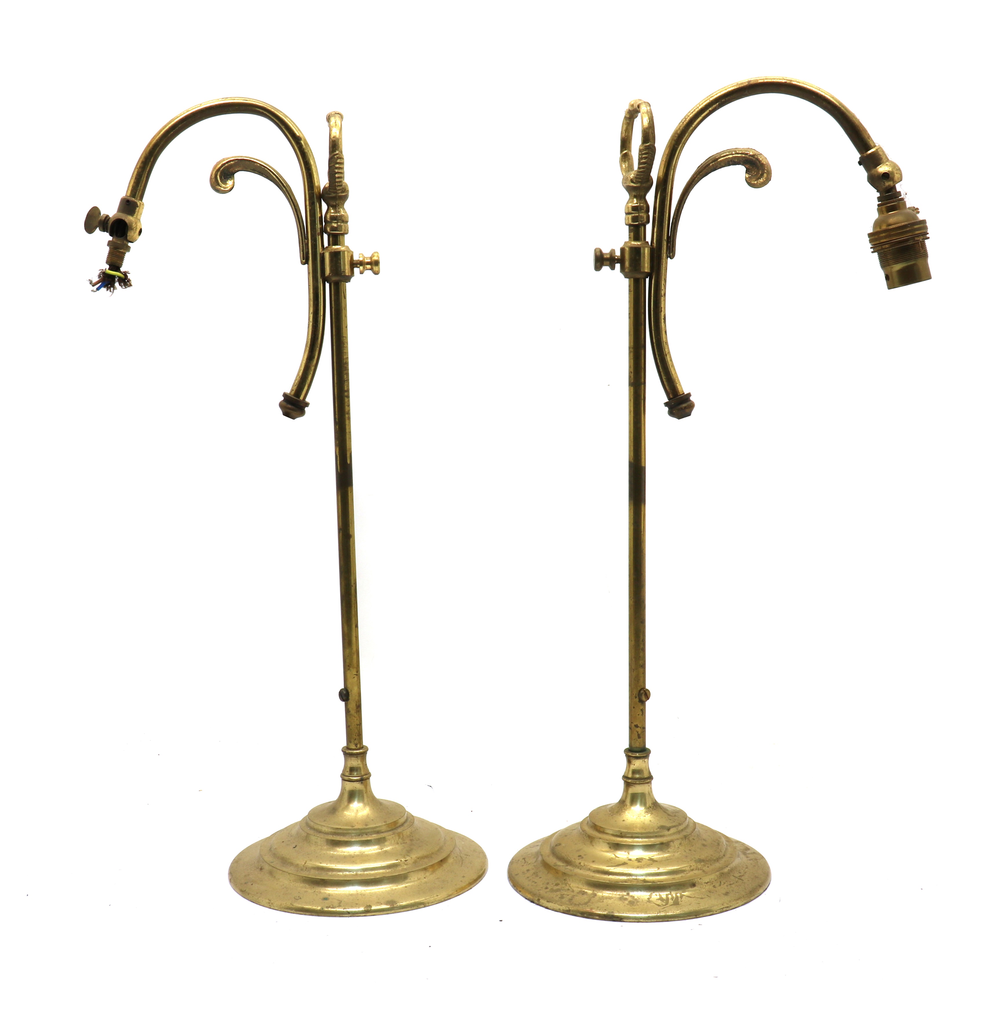 Lot 171 A pair of adjustable brass table lamps,