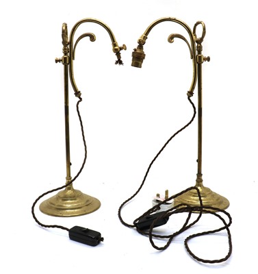 Lot 171 - A pair of adjustable brass table lamps