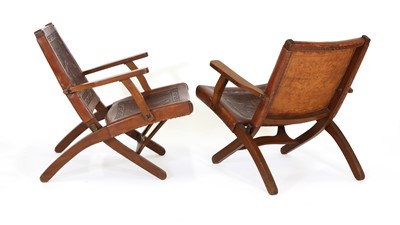 Lot 400 - A pair of hardwood and leather folding chairs