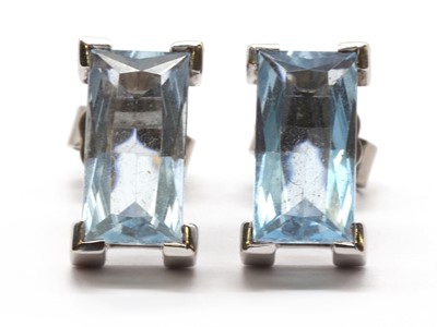 Lot 162 - A pair of 18ct white gold blue topaz earrings