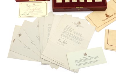 Lot 51 - A cased set of The Coronation Issue silver gilt stamps