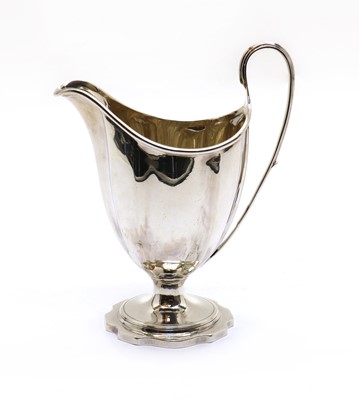 Lot 8 - A George III silver cream jug