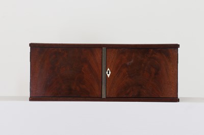 Lot 51 - A flame mahogany and ivory table cabinet