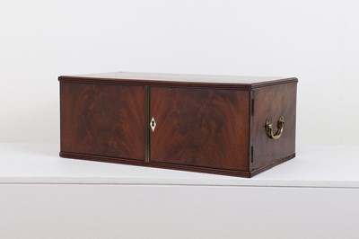 Lot 51 - A flame mahogany and ivory table cabinet
