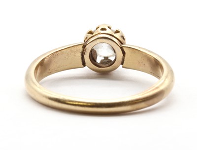 Lot 17 - A gold single stone diamond ring
