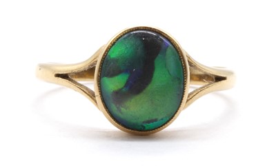 Lot 51 - A gold single stone black opal ring