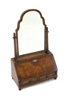 Lot 268 - A Queen Anne style walnut bureau mirror