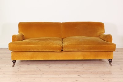 Lot A three-seater sofa by George Smith