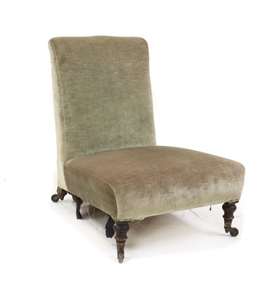 Lot 293 - A Howard and Sons low slipper chair