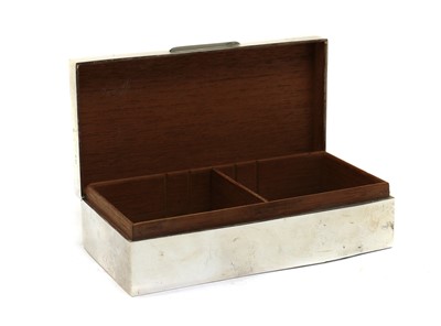 Lot 5 - A silver mounted cigarette box