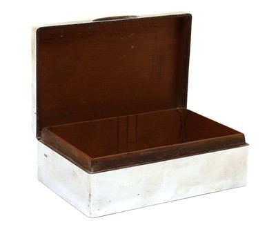 Lot 6 - A silver mounted cigarette box