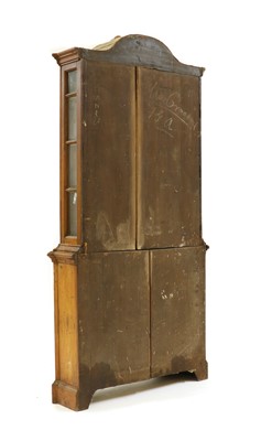 Lot 511 - A stripped pine cabinet