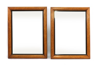 Lot 611 - A pair of burr maple wall mirrors