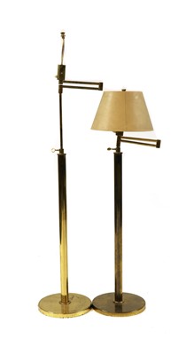 Lot 461 - Two brass floor lamps