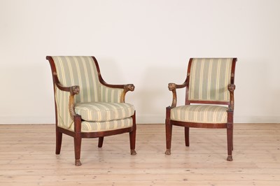 Lot 479 - A pair of French Empire mahogany elbow chairs