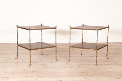 Lot 111 - A pair of brass étagères in the style of Maison Jansen