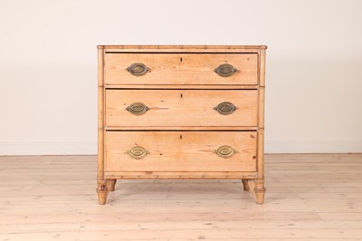 Lot 602 - A Victorian stripped pine three-drawer chest
