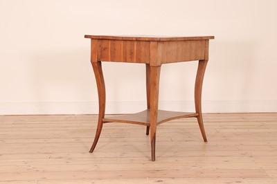 Lot 517 - A Biedermeier walnut and yew wood side table