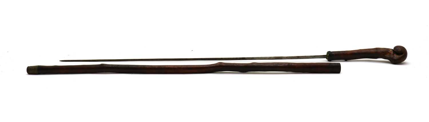 Lot 267 - A blackthorn root sword stick,