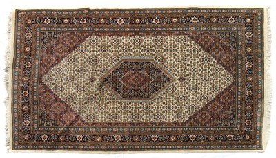 Lot 214 - A modern Persian design carpet