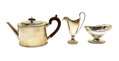 Lot 2 - A George III style silver three piece tea service