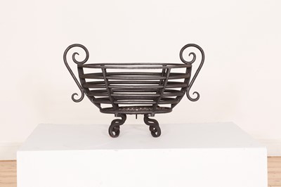 Lot 556 - A Regency-style steel fire basket