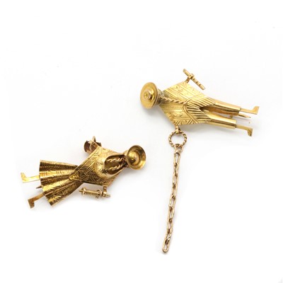 Lot 308 - A pair of gold brooches