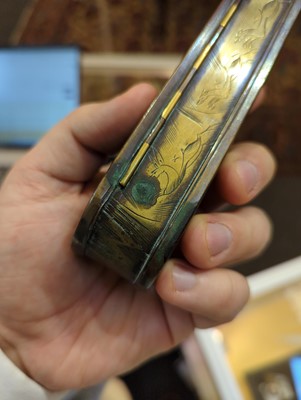 Lot 16 - A copper and brass tobacco box