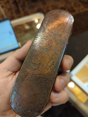 Lot 16 - A copper and brass tobacco box