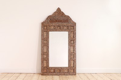 Lot 61 - A mother-of-pearl inlaid mirror in the Damascus style