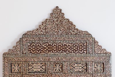 Lot 61 - A mother-of-pearl inlaid mirror in the Damascus style