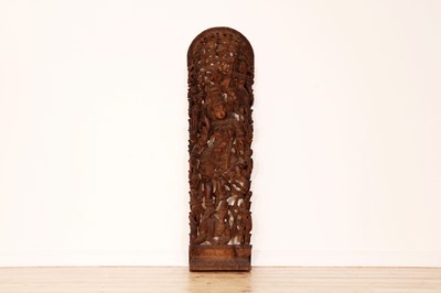 Lot 227 - A carved hardwood panel depicting a bodhisattva