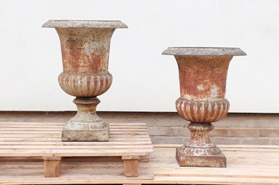 Lot 241 - A pair of cast iron campana urns