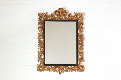 Lot 204 - A carved giltwood mirror in the Florentine style