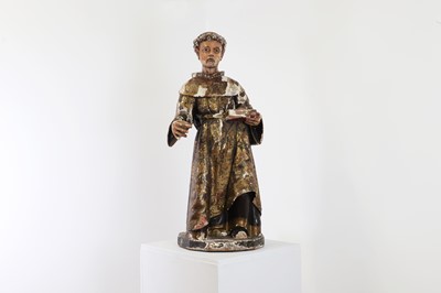 Lot 218 - A carved, painted and gilt, pine figure of St. Anthony of Padua