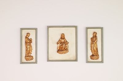Lot 223 - A carved giltwood relief triptych
