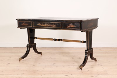 Lot 20 - A Regency-style ebonised writing table