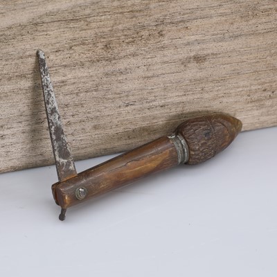 Lot 33 - An unusual pressed horn figural pocket knife