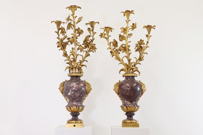 Lot A pair of brèche violette and ormolu candelabra