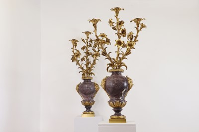 Lot A pair of brèche violette and ormolu candelabra